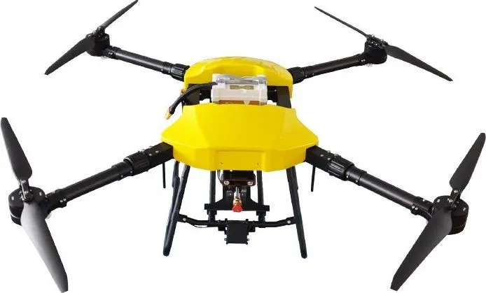 Cleaning drone head-on with all four arms unfolded and rotors fitted
