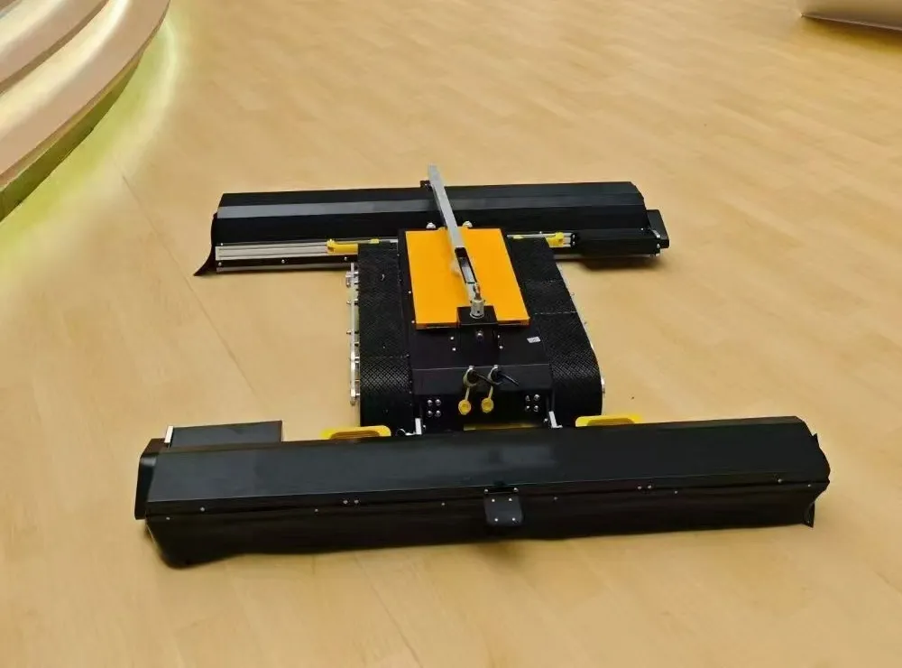 LUMEN T-Series tracked cleaning robot with a brush bar fore and aft