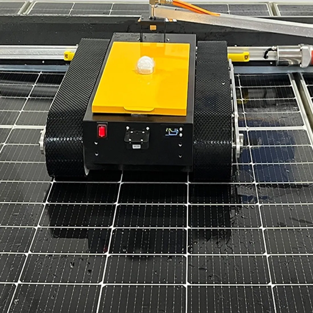 Cleaning robot with freshly cleaned panels behind it